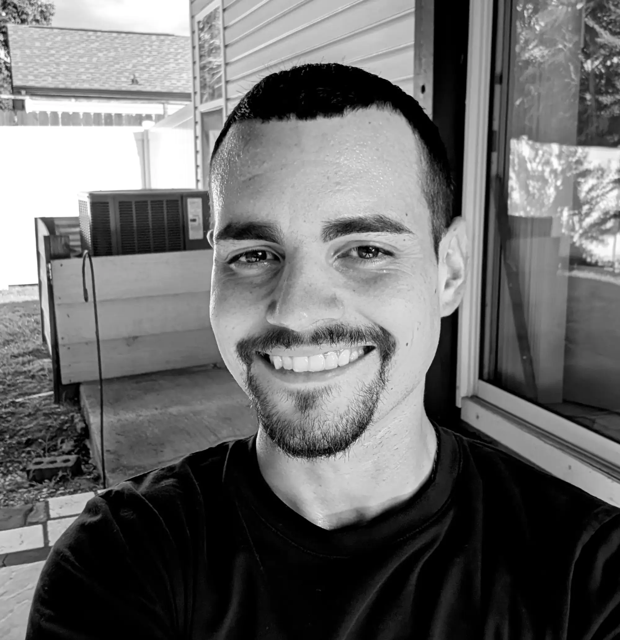 Professional headshot of Andrew Knowles